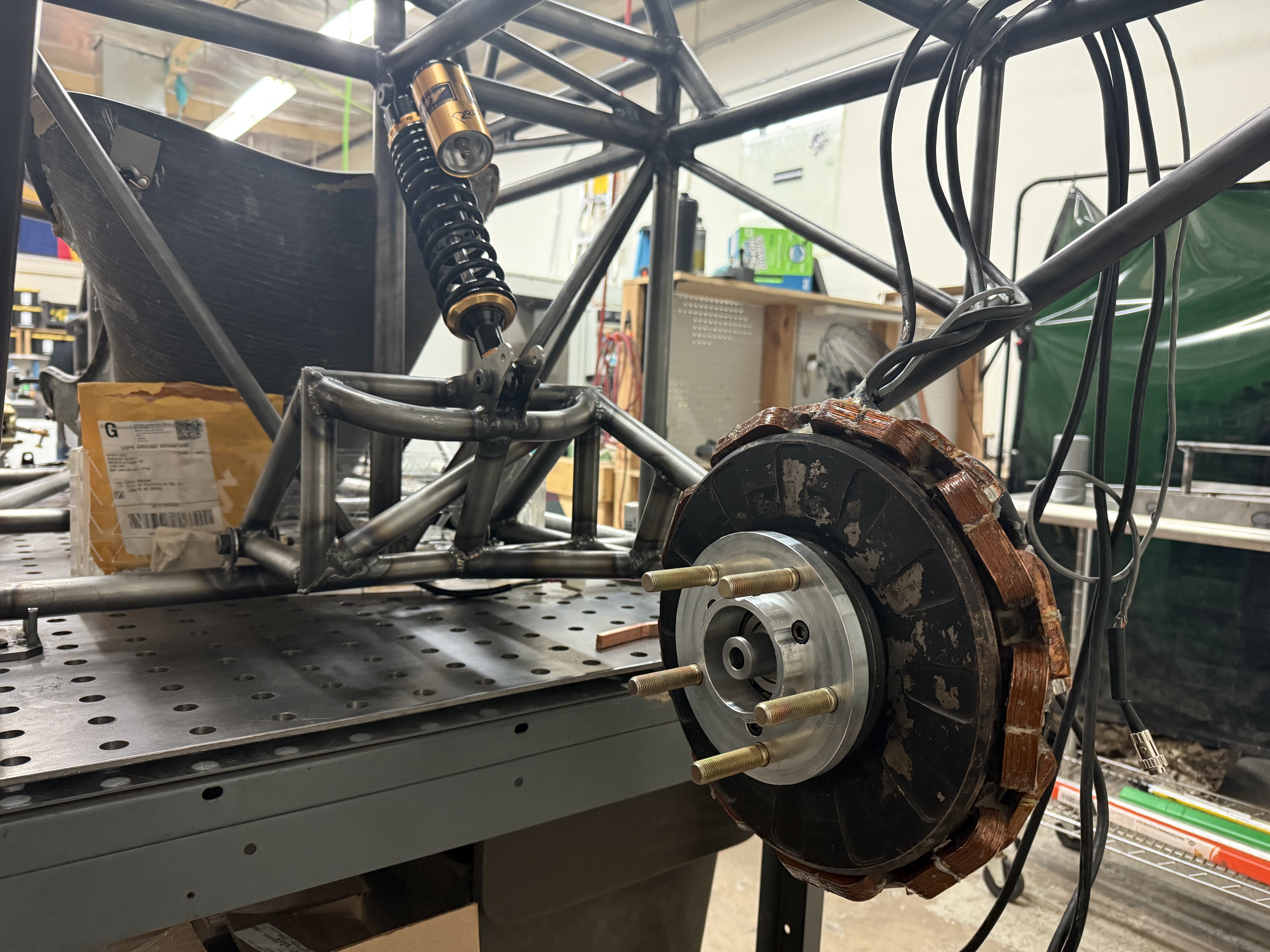 Trailing arm and motor mounted to the chassis